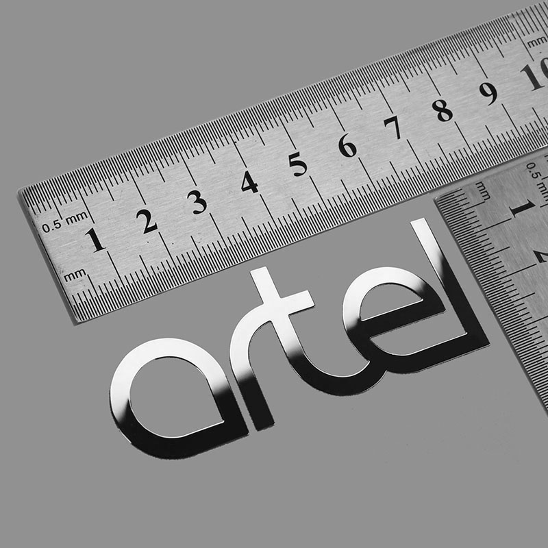 Logo metalowej naklejki
