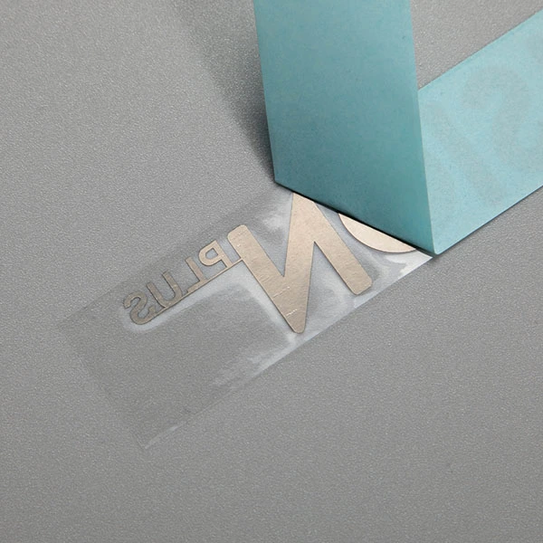 Naklejka z metalowym logo transferu
